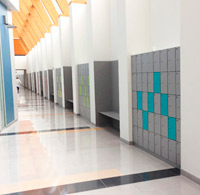 Lockers, benches and walls Trespa coverings. Central Hospital, HUCA. Oviedo.