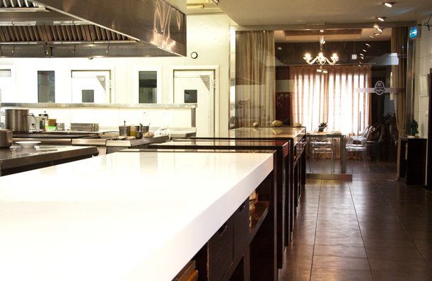 Custom wood and Corian table. Restaurant Casa Gerardo. Asturias.