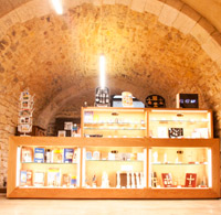 Counter display with illuminated windows. Oviedo Cathedral shop. Asturias.